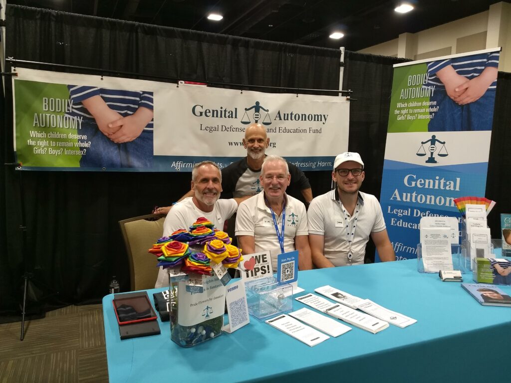 Riverside Pride (9-10-2023): Volunteers Brett Rosenberg, Marcus Valera and
Jacob Cox join Tim Hammond (center).